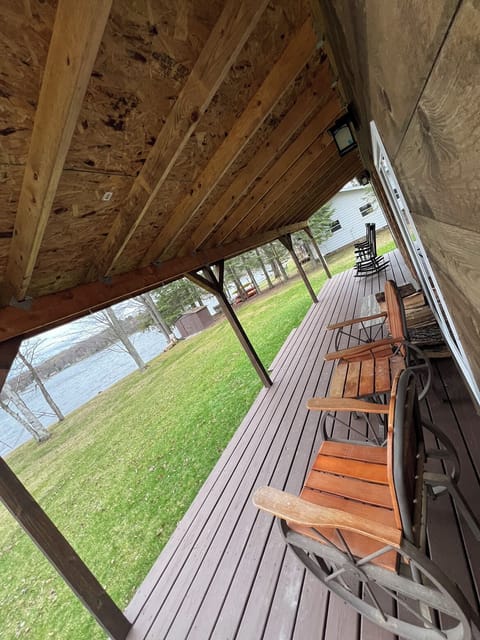 Covered porch for relaxing with a morning cup of coffee and breathtaking views.