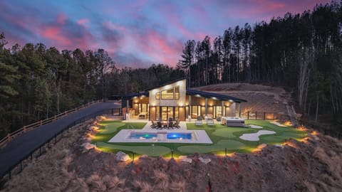Welcome to Ridgeline - your dream vacation home with a heated pool, incredible mountain views, a putt-putt course, and a hot tub!