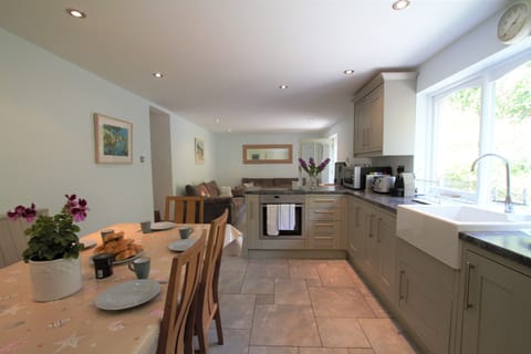 Kitchen with NEFF oven, induction hob and seating for 8