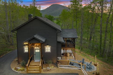 Stylish retreat with stunning mountain views and charming outdoor seating areas!