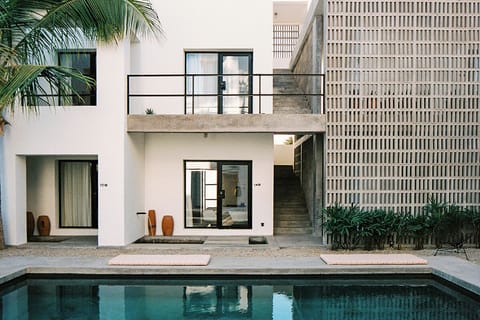 Return from the pool to peaceful, shaded rooms and terraces.