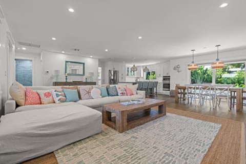 Welcome home! Our bright and inviting open-concept living space is perfect for relaxing and making memories. 🏡🛋️✨