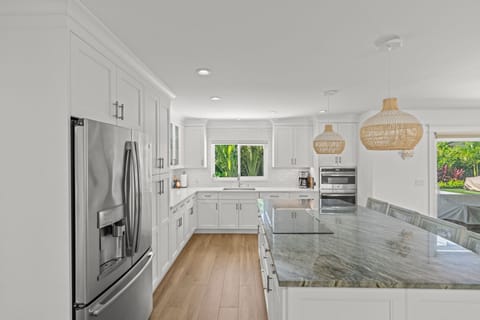 Your culinary adventure begins here! Our kitchen features sleek countertops and modern appliances for all your cooking needs. 🔪🍳✨