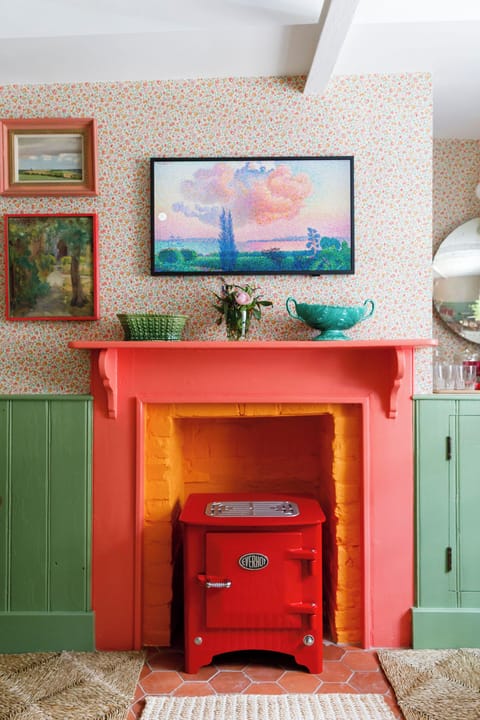 Fire place area with retro electric wood burner. 








































