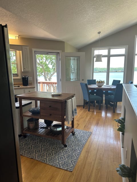 Prepare your food while looking at the lake! Table expands to fit up to 10 ppl.