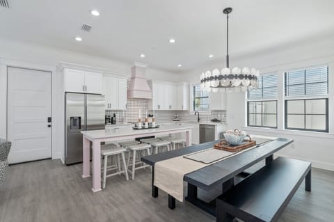 Flamingo's stylish dining area accommodates up to 8 at its main dining table