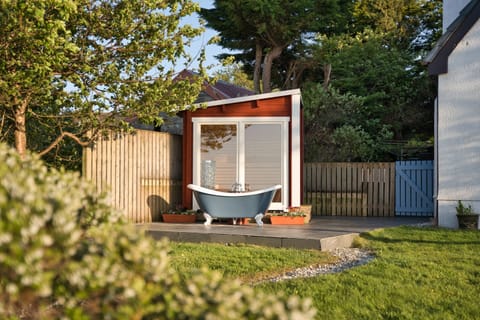 Sauna and outdoor bath with hot and cold tap