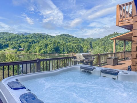 Ease into your day or unwind after a day of exploring in your private hot tub while taking in panoramic views of the lake and mountains.