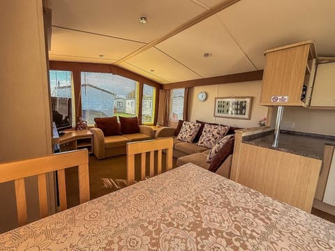 Step inside and discover the heart of your holiday home: the comfortable and inviting living room.