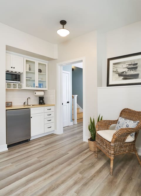 First level kitchenette with mini fridge and sink