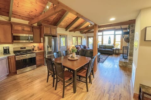 Share meals and conversation in this warm and welcoming space, designed for large groups and easy connection.