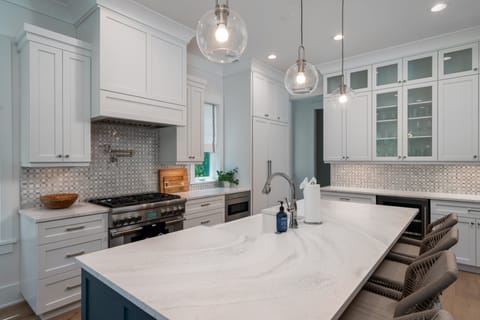 Large center island with four counter stools