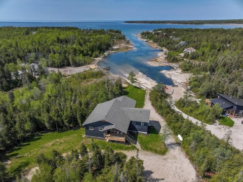 A view of the waterway leading out to the open water, perfect for exploring by kayak or paddleboard.