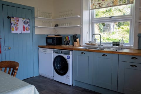 Kitchen with window overlooking garden