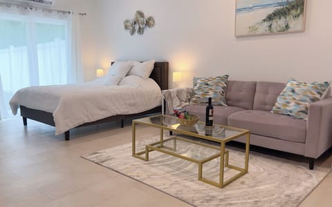 You will feel at home in this spacious studio with queen bed and seating area