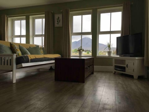 Livingroom with view of Beinn na Caillich
