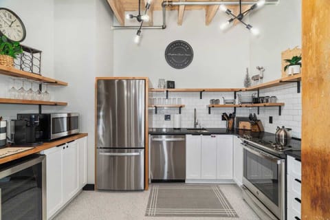 Step into your modern kitchen, where sleek design and chic vibes collide! Packed with all the essentials and trendy industrial touches, it's the perfect place to unleash your inner chef. Get ready to cook up some fun in this lively, stylish space!