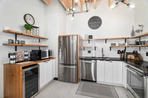 Prepare a gourmet feast, craft the perfect charcuterie board, or simply unwind with a cup from our coffee bar. This kitchen is fully stocked and ready for all your culinary adventures!