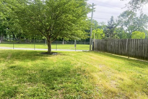 Large level fenced in yard - with more space available across the street