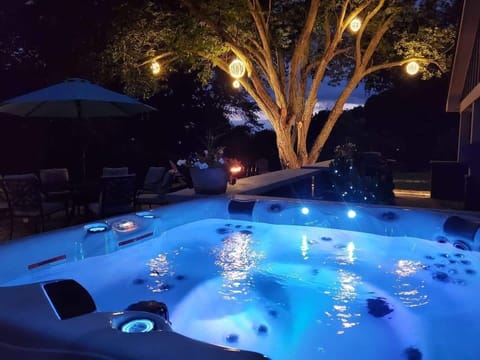 You will love our amazing back patio with hot tub, fire pit, plenty of seating, and lights in the trees to enjoy the beautiful mountain views.

The hot tub will be treated daily during your stay to ensure the chemicals stay balanced and water clear