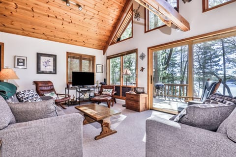 Floor to ceiling windows offer stunning views and ambient lighting.