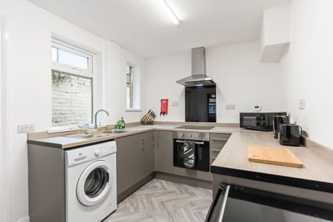 A fully equipped kitchen with everything you need to prepare a home cooked meal.