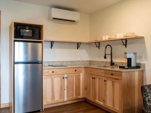 Start easy mornings with coffee and convenient kitchenette essentials.