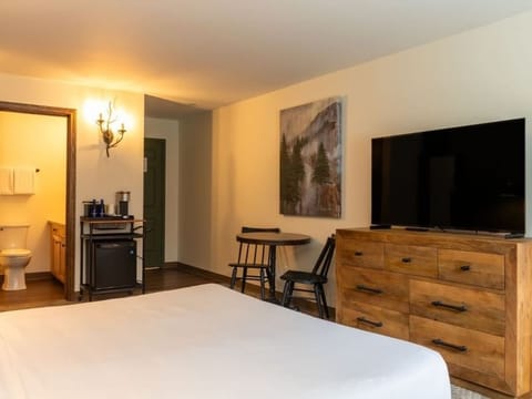 Settle in for movie night with TV and cozy seating.