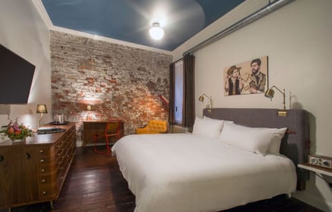 Cozy bedroom nook with warm lighting and eclectic decor