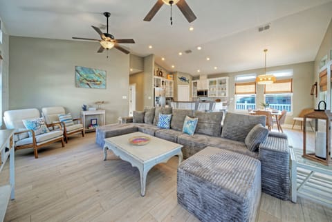 Living room offers comfortable seating and a sleeper sofa.