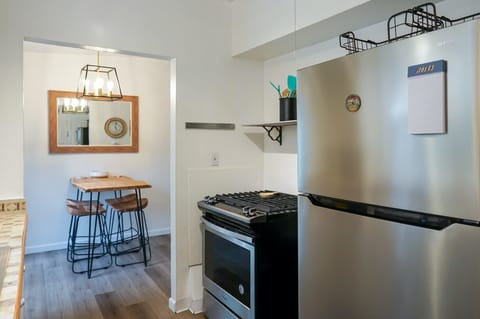 While stainless steel appliances bring efficiency and style to this retro-inspired kitchen