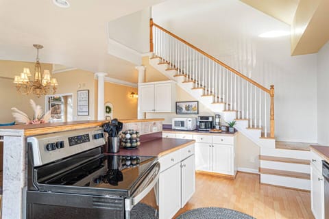 Kitchen Delight: Modern appliances and bright decor for culinary adventures await!