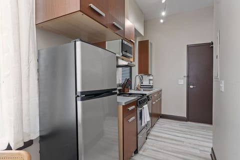 Kitchen conveniences, includes refrigerator.