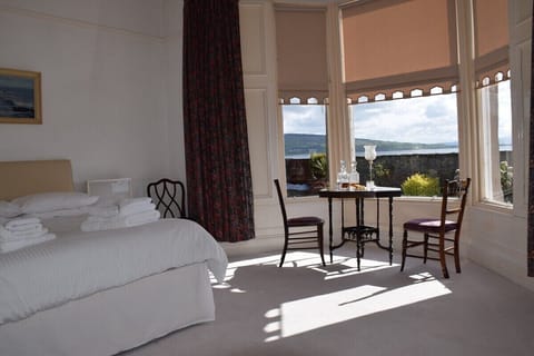 Scalpsie Bay bedroom with large bay window looking out over the sea