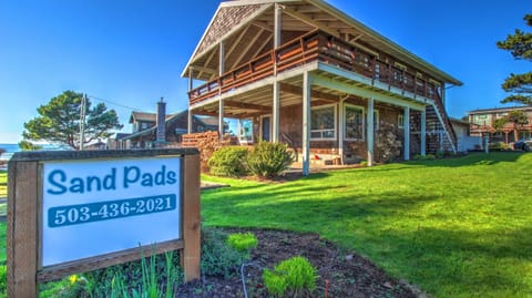 Sand Pads Exterior - Exterior showing second floor deck.
