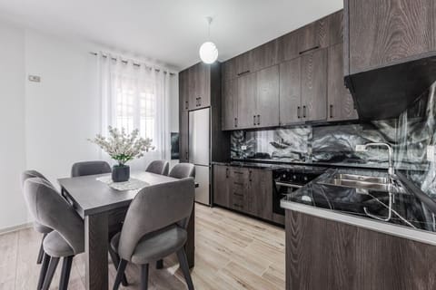 Fully-Equipped Kitchen & Dining Area