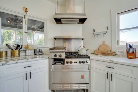Cook, dine, and entertain with ease in this beautifully designed kitchen.