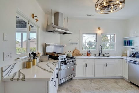 This kitchen combines style and functionality, making it the heart of your stay.