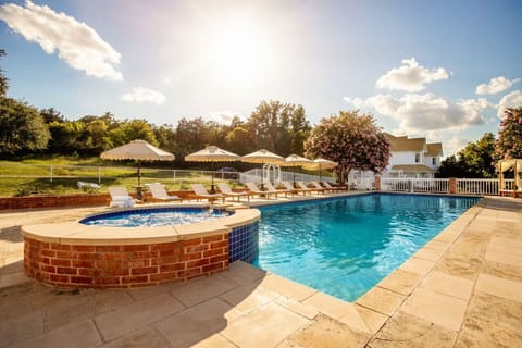 Enjoy the stunning hotel sized pool deck with hot tub, huge pool and plentiful seating for all.