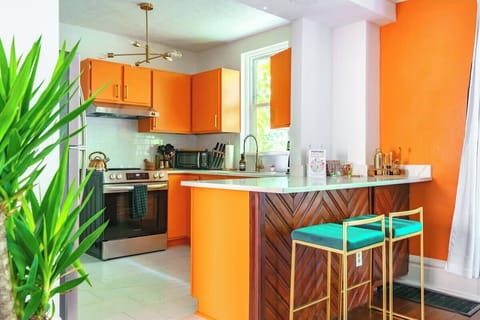 Dine in style at our reclaimed wood dining table, which combines sustainability with unique design. The spacious dining area ensures a comfortable dining experience.