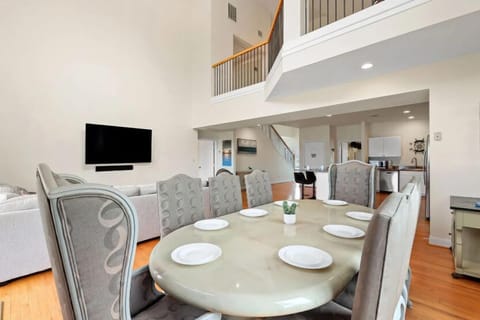 There are 4 additional spaces at the kitchen counter.