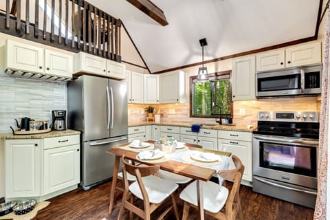 Kitchen with granite countertops and modern appliances