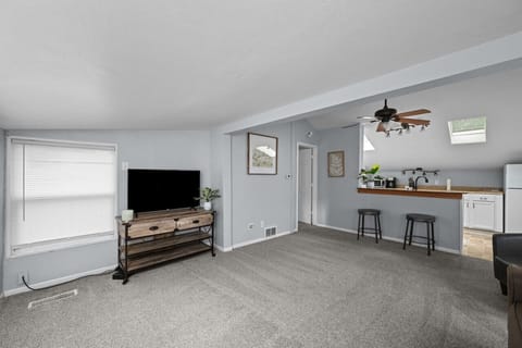 Flat Screen 55` smart TV with Youtube TV live cable in a spacious living room