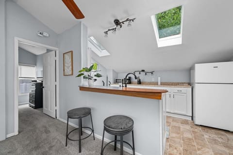 Work or take a load off at the kitchen bar top