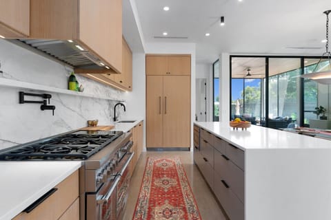 Kitchen with Bar dining, and Thermador Appliances