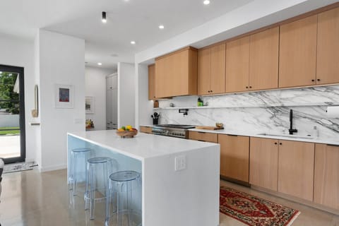 Kitchen with Bar dining, and Thermador Appliances