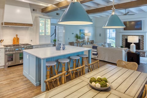 Updated kitchen with bar stools and dinging area-also a wolf range