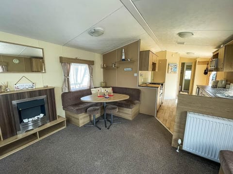 The spacious living room is designed for your family to gather, relax, and create lasting memories together.