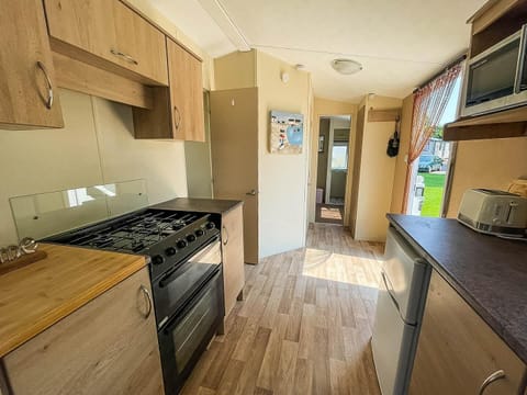 Our dog-friendly caravans feature practical kitchens designed with pet owners in mind.