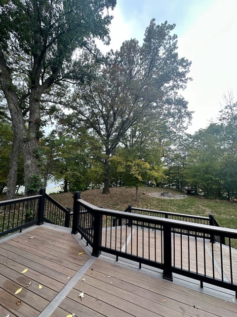 View of the lake and the fire pit from the deck